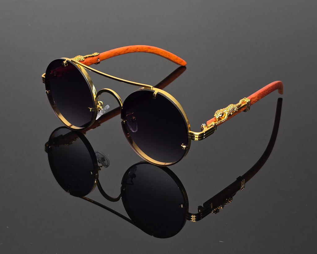 Lunettes de soleil rondes  marrons dorées détails guépard vintage steampunk style luxe