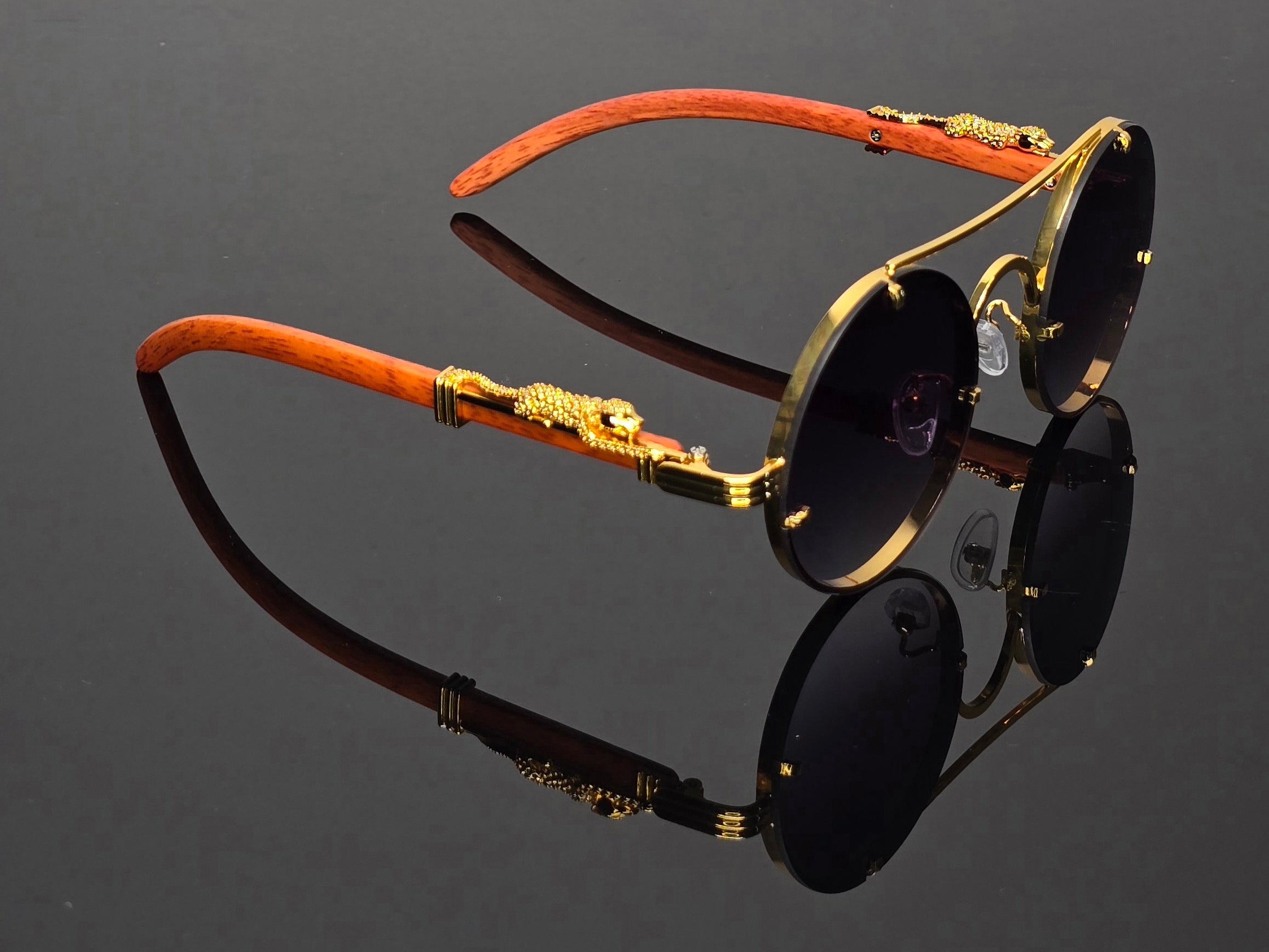 Lunettes de soleil rondes  marrons dorées détails guépard vintage steampunk style luxe