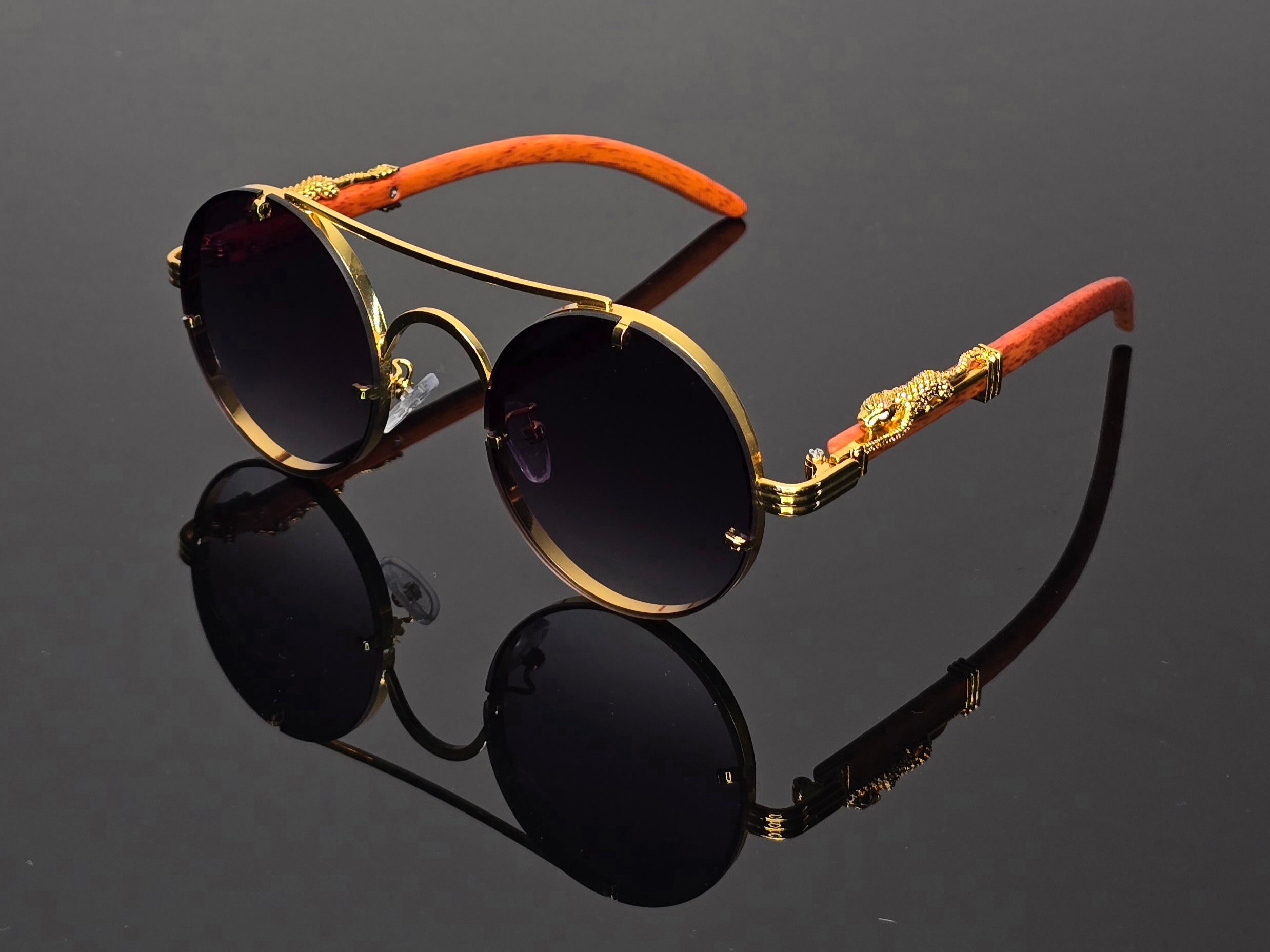 Lunettes de soleil rondes  marrons dorées détails guépard vintage steampunk style luxe
