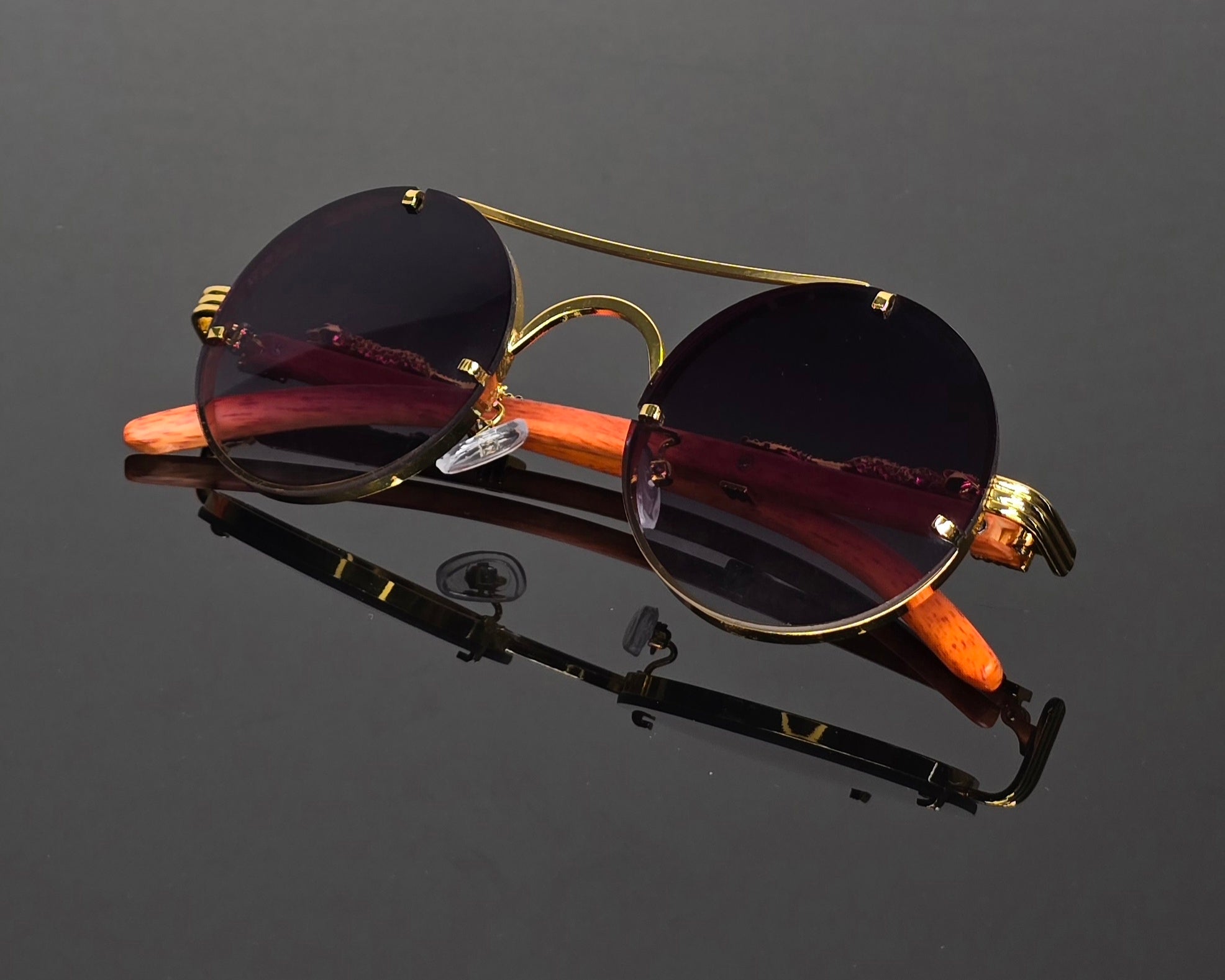 Lunettes de soleil rondes  marrons dorées détails guépard vintage steampunk style luxe