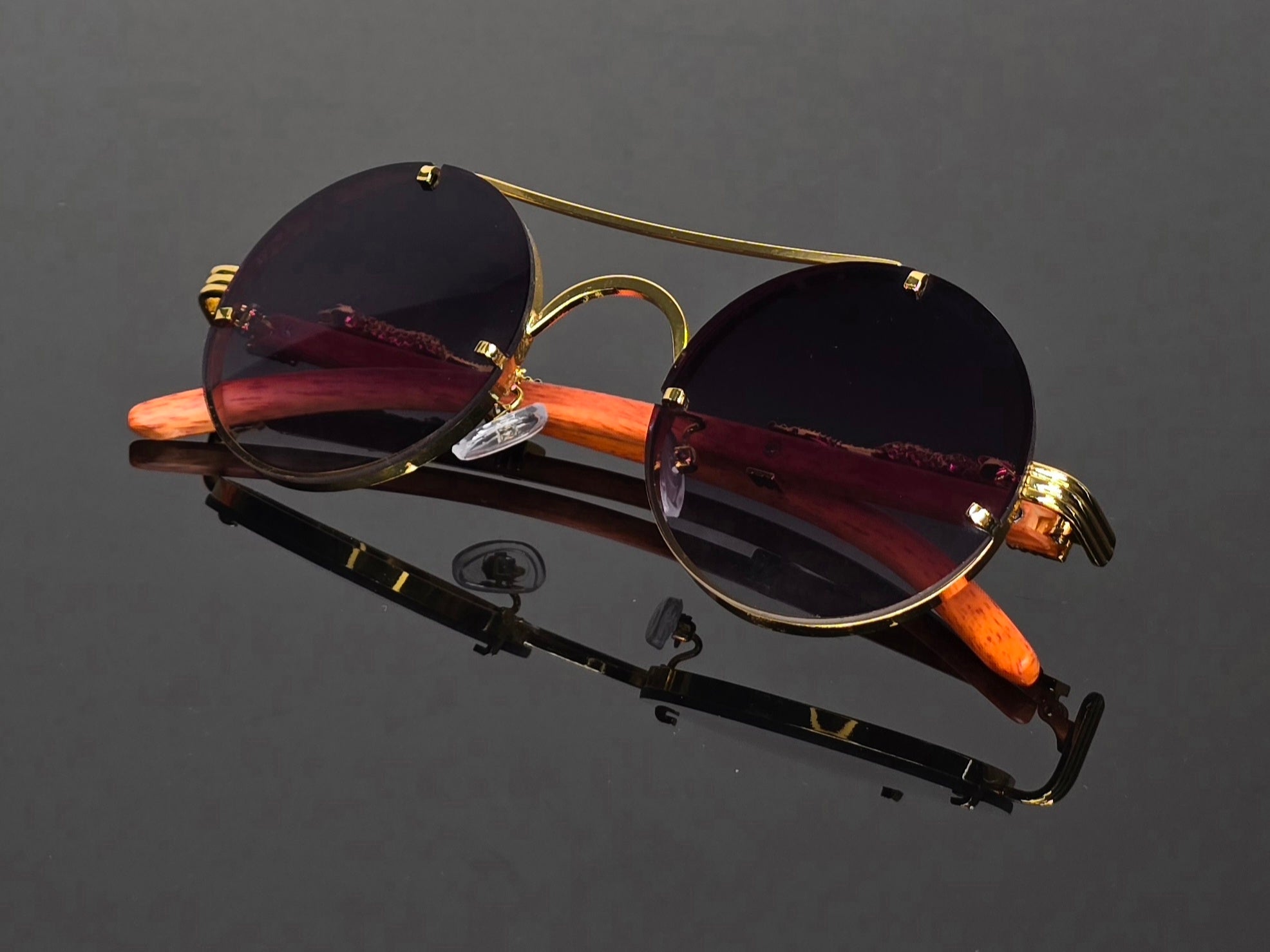 Lunettes de soleil rondes  marrons dorées détails guépard vintage steampunk style luxe