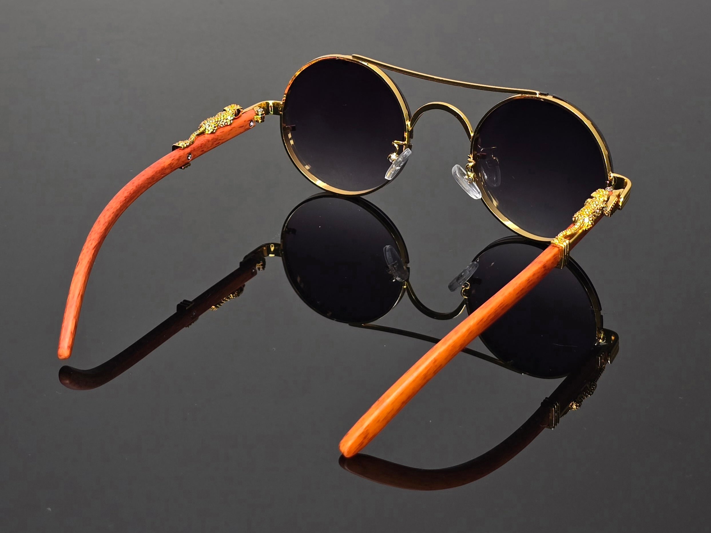 Lunettes de soleil rondes  marrons dorées détails guépard vintage steampunk style luxe